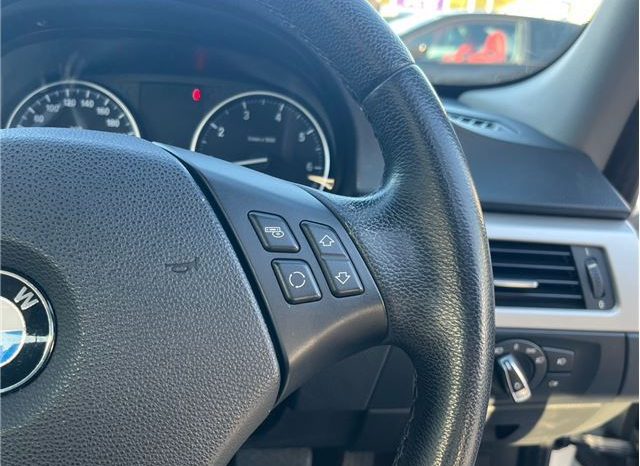 BMW 3 Series 320i 2010 full