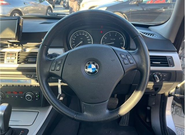 BMW 3 Series 320i 2010 full