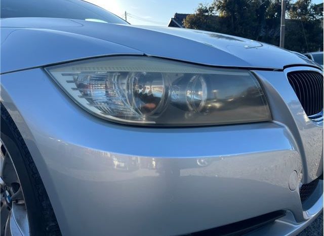 BMW 3 Series 320i 2010 full